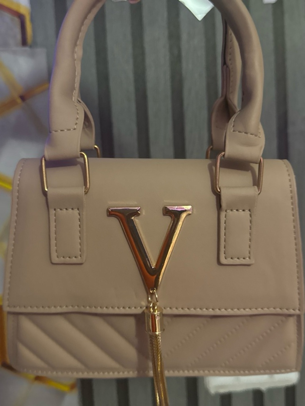 Elegant Beige Top-Handle Women's Bag with Gold V Accent